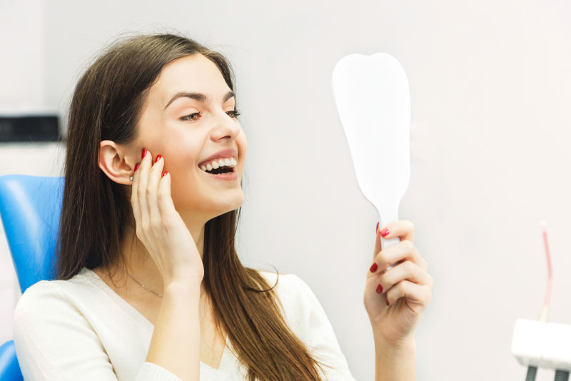 dental patient smiling after procedure