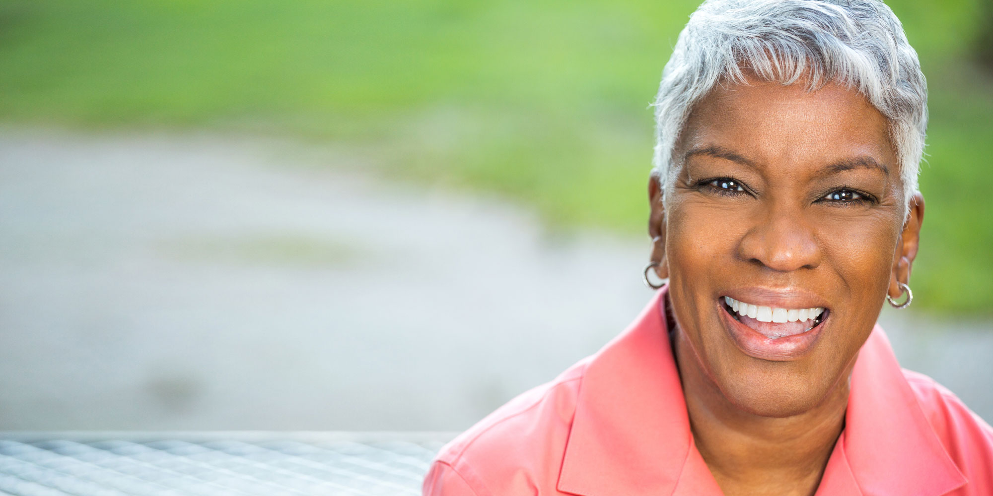 full mouth dental implants patient smiling.